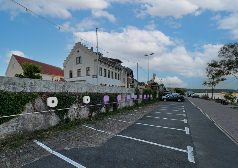 LADE wallboxes along several parking lots